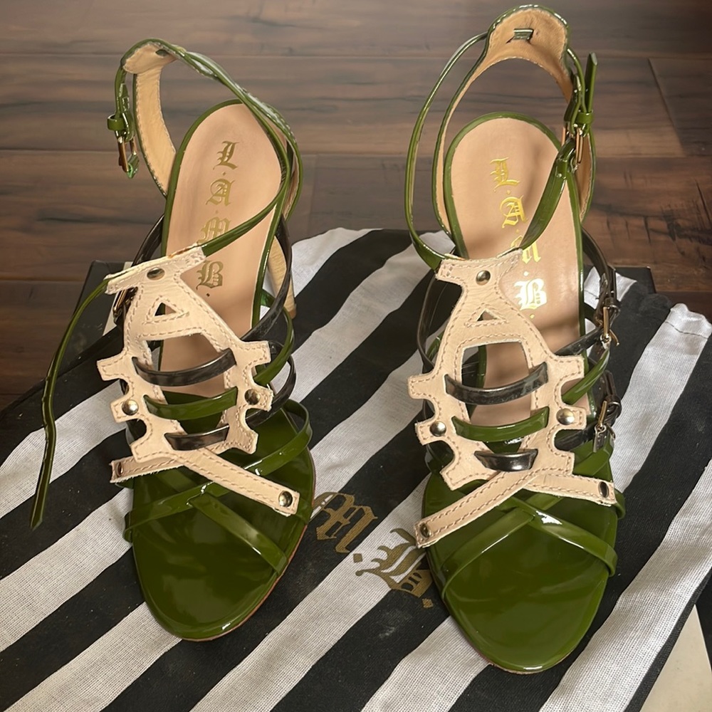 Gorgeous pair of  L.A.M.B green and cream straps heels.